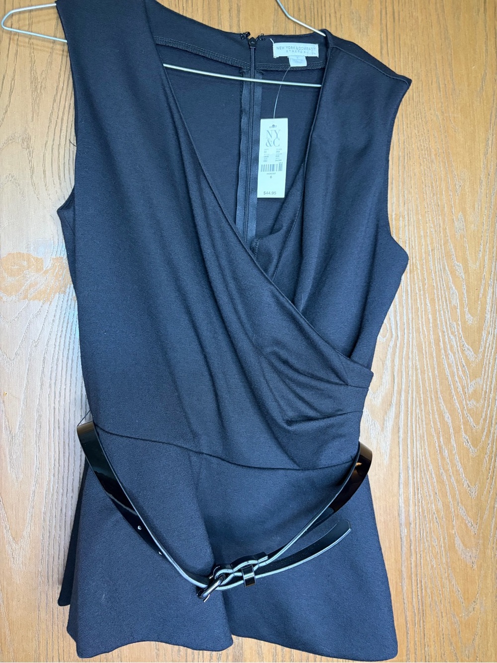 New York & Company Black Sleeveless Peplum Top